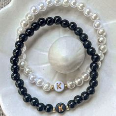 One bracelet please let me know what color you would like in the customize box, have all letters  available🤍 Boho Jewlery, Letter Sign, Pearl Beads, Faux Pearl, Jewelry Bracelets, Handmade Items, Great Gifts, Beaded Bracelets, Let Me