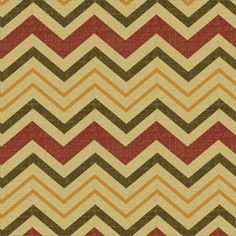 an orange and brown zigzag pattern on fabric