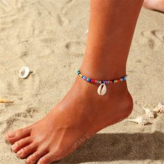 From barefoot strides to sunny-day soirees, lend some color to your step with this stretchy beaded anklet sporting a cowrie shell charm. 7.87" L Stretch Silver-plated copper / shell / howlite Moon Cactus, Elegant Anklet, Jewelry Friendship, Summer Beach Jewelry, Beaded Ankle Bracelets, Lock Pendant, Beaded Ankle, Beaded Anklet, Bracelets Handmade Diy