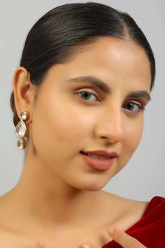 This pretty handcrafted drop shaped earrings, This surreal combination will give you perfect festive look. Product Features: Color: Golden Material: Metal - Copper And Alloy Work: Kundan With Meenakari On Back Side Measurement: Length - 1.25in, Width - 0.6in Package Contents: 1 Pair Earrings Fastening: Earrings - Push Back Care Instructions: Spot-Cleaning only. Keep away from fragrance and water.Store in a dry plastic pouch. Occasion: Festivewear , Partywear, Casual, Wedding Guest Product Type: Back Care, Plastic Pouch, Festive Look, Kundan Earrings, Innovative Fashion, Traditional Sarees, You Are Perfect, Summer Ready, Online Earrings