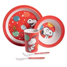 a set of children's dinnerware including a bowl, fork and spoon