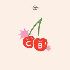 two cherries with the letters c and b on them