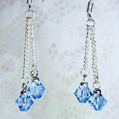 Cynthia Lynn "Celebrate" Sterling Silver Topaz Blue Swarovski Crystal December Birthstone Earrings 1.75" Brand New! Artisan Crafted. Includes Drawstring Gift Bag. Matching Pieces Pictured Are Sold Separately. Blue Sterling Silver Jewelry For Celebration, Celebration Blue Sterling Silver Jewelry, Blue Dangle Earrings For Celebration, Blue Sterling Silver Crystal Earrings For Formal Events, Blue Sterling Silver Crystal Earrings For Formal Occasions, Blue Sterling Silver Earrings For Party, Hypoallergenic Sterling Silver Crystal Earrings For Party, Blue Hypoallergenic Jewelry For Party, Hypoallergenic Blue Jewelry For Party