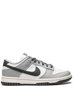 Dunk Low sneakers from NIKE featuring light grey, dark grey, white, leather, panelled design, signature Swoosh logo detail, perforated toebox, branded insole, flat rubber sole and front lace-up fastening. These styles are supplied by a premium sneaker marketplace. Stocking only the most sought-after footwear, they source and curate some of the most hard to find sneakers from around the world.. Sneakers That Go With Dresses, Nike Dunks Mens, Mens Nike Dunks, Nike Dunks Men, Nike Dunks Grey, Mens Dunks, Womens Dunks, Grey Nike Dunks, Dunks Men