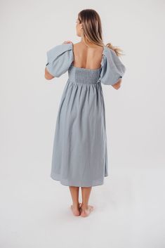 The Hamilton is everything you're looking for in a midi dress - charming, sophisticated, and absolutely flattering. It features premium quality details, like a sweetheart neckline and gorgeous balloon sleeves that can be worn on or off the shoulder. It's an unforgettable choice for every body type, and extra-comfy for expecting mamas! The best part? You can wear this beauty long after your sweet baby arrives! Available in multiple colorways. FIT: Runs true to size. Features a smocked back panel for comfort. This dress is roomy in the waist and will accommodate early maternity in your true size, but consider sizing up if you are in advanced pregnancy. MATERIAL: GARMENT DETAILS: Empire-waisted midi dress, with sweetheart neckline and statement balloon sleeves that can be worn on or off the s Casual Midi Dress With Sweetheart Neckline For Dress Down, Casual Midi Dress With Sweetheart Neckline For Brunch, Spring Brunch Puff Sleeve Dress With Sweetheart Neckline, Chic Midi Dress With Gathered Sleeves For Brunch, Casual Puff Sleeve Dress With Sweetheart Neckline For Brunch, Spring Puff Sleeve Midi Dress With Fitted Bodice, Midi-length Puff Sleeve Dress For Brunch, Brunch Midi Length Puff Sleeve Dress With Elastic Sleeves, Midi Length Puff Sleeve Dress For Day Out