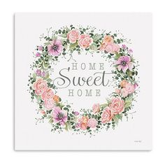 a white card with pink flowers and the words home sweet home in front of it