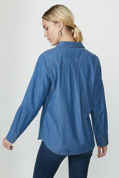 A shirt made for your weekend wardrobe. Bringing instant off-duty style, the chambray fabric flows down your figure for a super-relaxed look. Classic stitching and tortoiseshell button detail ensure you'll be wearing it from season to season to season! Chambray Fabric, Latest Tops, Weekend Wardrobe, Chambray Shirt, Off Duty, Button Detail, Chambray, Buy Online, Stitching