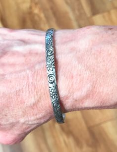 This is a cute bracelet. This patterned bangle is made with heavy gauge sterling silver. The bangle shown is 2.5 inches in diameter and will fit most wrists. It is also available 2.25, 2.75 and 3 inches in diameter. It is also available not oxidized: https://www.etsy.com/listing/471375282 How to measure your hand for a bangle: Make your hand as small as possible, as if you were putting on bangles, bringing your thumb and little finger together. 2. Using the tape measure (or string), measure the Cute Bracelet, Bangles Making, Grand Junction, Sterling Silver Bangle, Bracelet Sterling Silver, Sterling Silver Bangles, Silver Bangle, Cute Bracelets, Oxidized Sterling Silver