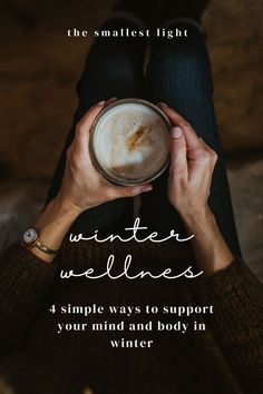 a woman holding a cup of coffee with the words winter wellness written on it