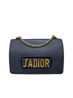 Bag signed Dior, Jadior model, made of midnight blue grained leather with golden hardware. Equipped with a flap with magnetic closure, internally lined in tone-on-tone suede, roomy for essentials. Equipped with a sliding chain shoulder strap, to wear the bag both over the shoulder and across the body. Featuring front metal writing and an internal pocket, complete with dustbag, it is in good condition. Metal Writing, Blue Shoulder Bag, Designer Products, Magnetic Closure, The List, Midnight Blue, Dust Bag, Shoulder Strap, Dior