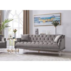 a living room scene with focus on the couch and chair