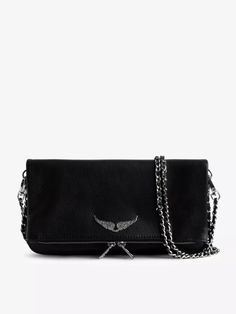 Lauded for its ultra-modern Parisian style, Thierry Gillier's brandchild Zadig & Voltaire has been crafting wholly unique ready-to-wear and accessories since the late '90s. Realised in subtly grained leather, the Rock clutch bag folds out to a longer design with a spacious zipped compartment and organised slip pockets, while the silver-toned accents and sparkling eagle logo add a bold finish. (Height 15cm, width 26cm, depth 3cm) Sustainable Leather, Zara Bags, Leather Wear, Zadar, Pretty Bags, Double Chain, Zadig And Voltaire, Leather Items, Leather Clutch