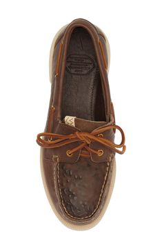 This latest iteration of the brand's Americana deck shoe features a lower profile and is shaped from vegetable-tanned leather that's custom painted on the vamp. Lace-up style Leather upper and lining/rubber sole Imported Designer Shoes Asian & Pacific Islander Owned/Founded Brown Low-top Leather Shoes With Vibram Sole, Leather Lace-up Loafers With Vibram Sole, Brown Moc Toe Lace-up Shoes With Leather Sole, Deck Shoes Men, Brown Lace-up Moccasins With Vibram Sole, Brown Moc Toe Slip-on Tassel Loafers, Deck Shoes, The Vamps, Vegetable Tanned Leather