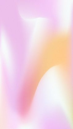 an abstract blurry background with pink and yellow colors