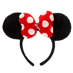 a minnie mouse ears headband with polka dots