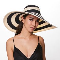 SUNNY Ivory/black striped toyo wide-brim sunhat. Includes discreet adjustable grosgrain on inside crown for desired fit. UPF +30 Protection. From the Eugenia Kim Core Collection. 6" X 3.5" X 7" SKU: 21012-170CS Kim Core, Black Sunhat, Luxury Hats, Carmel By The Sea, Western Chic, Eugenia Kim, Fall Shopping, Scarf Hairstyles, Active Wear Tops