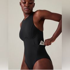 Reposhing This Item I Purchased From @Whysuchadeal. Loved It, But It Was A Little Loose On Me. Questions? Leave A Comment Below! Functional Black Swimwear With Built-in Bra, Sporty Compressive Sleeveless Swimwear, Sporty Sleeveless Bodysuit For Poolside, Black One-piece Swimwear For Workout, Black Racerback Bodysuit For Swimming, Black Racerback Workout Bodysuit, Black Compressive Functional Swimwear, Sporty Compressive Bodysuit For Swimming, Black Racerback Athleisure Bodysuit