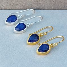 DaniMini Blue Sapphire Gold Earrings 18 CT Gold Vermeil on Sterling Silver GEMSTONE BLUE SAPPHIRE  A simply beautiful everyday earrings with a unique gemstone. Perfect to combine with other jewels from the same collection. Tiny and Dainty hook earrings Soft Brushed Textured Gemstone Length 9mm x 6mm Total length of the earrings including hooks is 3cm. ★GEMSTONE CORUNDUM BLUE SAPPHIRE September birthstone Sapphire have properties of protection, bringing spiritual insight, and good fortune. Note t Teardrop Sapphire Jewelry With Matching Earrings, Sapphire Teardrop Earrings With Ear Wire, Sapphire Teardrop Gemstone Earrings, Faceted Teardrop Earrings For Jewelry Making, Teardrop Sapphire Earrings For Gift, Sapphire Teardrop Birthstone Earrings, Teardrop Sapphire Faceted Jewelry, Faceted Teardrop Sapphire Jewelry, Jewellery Women