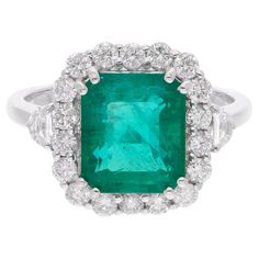 Item Code :- SER-22783 Gross Wt. :- 4.82 gm 18k White Gold Wt. :- 3.95 gm Natural Diamond Wt. :- 0.81 Ct. ( AVERAGE DIAMOND CLARITY SI1-SI2 & COLOR H-I ) Emerald Wt. :- 3.52 Ct. Ring Size :- 7 US & All ring size available ✦ Sizing ..................... We can adjust most items to fit your sizing preferences. Most items can be made to any size and length. Please leave a note at checkout or contact us via 1stDibs conversation. Even after purchasing the item, you can still ask us to adjust the size or length. We will try our best to fix it if it is possible. ✦ Import Duties, Taxes and Custom Charge ..................... Import duties, taxes and customs charges are not included in the items price or shipping cost. These charges are the buyer's responsibility. Please check with your country's c Cocktail Ring Diamond, Emerald Cocktail Ring, Emerald Cocktail, Jewels Rings, Handmade Fine Jewelry, Zambian Emerald, Diamond Cocktail Rings, White Gold Jewelry, Emerald Gemstone