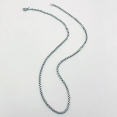 This trendy chain necklace is the perfect way to add a touch of personality to your look. The unique box chain design is both stylish and modern, and the versatile length makes it easy to wear with any outfit. Layer it with other necklaces for a more personalized look, or wear it alone for a minimalist statement.Available in gold and silver. Everyday Metal Necklaces With Rolo Chain, Modern Box Chain Necklace Gift, Metal Chain Necklace With Box Chain Links, Metal Link Chain Necklace With Box Chain, Trendy Silver Necklace With Box Chain, Minimalist Adjustable Chain Necklace, Trendy Silver Box Chain Necklace, Box Chain Necklace As Gift, Minimalist Long Box Chain Necklace