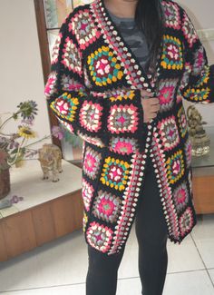 Handmade Crochet jacket, Woolen Knit Colorful Winter coat, Granny Square, Patchwork Hippie Cardigan, Boho Wool Sweater Measurements of this granny jacket : Size:  43 -48 inch (110-125 cm) chest x 30-34 inch (75-85 cm) length Made of worlds best highest quality wool and acrylic blend yarn Very stylish and fashionable Lightweight and elegant and keeps you very warm Wash Instructions: Machine washable at low temperatures.  soak the piece for 30 minutes in luke warm water -machine wash gentle (15 C/ Long Winter Outerwear With Granny Square Details, Granny Square Jacket Pattern Free Coats & Jackets, Granny Square Patchwork, Hippie Cardigan, Cozy Multicolor Outerwear With Granny Square Detail, Vintage Multicolor Granny Square Outerwear, Granny Square Cardigan Coats & Jackets, Square Patchwork, Water Machine