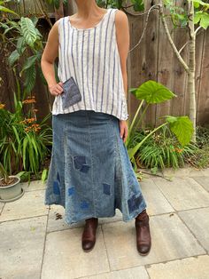 'Tamar' denim skirt, midi and flared fit. Lots of stitches and denim pieces...very pretty. the skirt is a size 4, no stretch. Zipper and a hook on the side. I find it very comfy and special with all that fabric at the bottom. Would go well with any top, sneakers or boots, summer and winter. Great piece to own. Waist: 30 In. Hip; 41 In. Length; 33 In. Care; machine wash warm Dry:tumble dry warm You can find many like this one at my Etsy store: https://www.etsy.com/shop/BreakfastWithMatisse Boho c Flare Denim Skirt, Denim Skirt Midi, Midi Jean Skirt, White Palazzo Pants, Flared Denim Skirt, Boho Jeans, Midi Jeans, Boho Denim, Pink Tunic