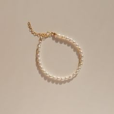 A classic pearl piece that will never go out of style. Handmade with freshwater rice pearls and 14k gold filled findings. She's the matching bracelet for the Vivian Pearl Choker. Wear it with Alida Pearl Ring, they are the perfect match! Details 3.5mm freshwater rice pearls.  14k gold filled. Extender chain of 3.5cm is available as an add-on. Wanna browse more of my bracelet series? https://www.etsy.com/ca/shop/PrettyPearlfect?section_id=31793519 Take a look at my shop to discover more pieces th Etsy Finds Products, Rice Pearls, Pearl Bracelets, Freshwater Pearl Jewelry, Freshwater Pearl Ring, Matching Bracelet, White Jewelry, Pearl Charms, Pearl Choker