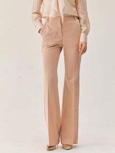 This product features the Vashti bootcut trousers, which are a contemporary update on a classic style. The trousers boast a flattering bootcut silhouette that gently flares from the knee to hem, creating an elongated look. Tailored to perfection, these trousers sit at the natural waist and are designed to offer both comfort and a streamlined appearance. - The bootcut silhouette of these trousers offers a flattering shape that balances proportions and elongates the legs.- Sitting comfortably at the natural waist, they provide a fit that's both secure and stylish.- Tailored construction ensures a polished look, ideal for a professional setting or a sophisticated casual outfit.- These trousers are a versatile staple, easily paired with various tops and shoes for a range of occasions. Spring Workwear Wide Leg Flares, Elegant Spring Flares For Workwear, Elegant Straight Leg Flares For Workwear, Fitted Flares For Workwear In Spring, Formal Flare Wide Leg Pants For Spring, Chic Spring Workwear Flares, Formal Spring Flared Wide Leg Pants, Spring Formal Flare Wide Leg Pants, Elegant Full Length Spring Flares