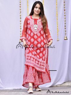 FREE INNER Kurta sharara set Red chikankari kurta palazzo set Indian lucknawi chikan handmade kurtiDisclaimer : : Motifs of embroidery may vary as the images shown are for illustration purpose.PRODUCT SPECIFICATIONSColor : Red Fabric : Faux GeorgetteSleeves : 3/4 SleevesStyle : Ethnic WearLength : 42-44 InchesOccasions : Casual Wear, Office Wear, Party WearPrice Includes : As per choiceGarment Care : Hand Wash OnlyPRODUCT FEATURESFlawless finishingElegant looksAlluring patternsSkin friendlyShrin Red Sharara With Chikankari Embroidery And Straight Kurta, Straight Kurta Sharara With Chikankari Embroidery, Festive Sharara With Chikankari Embroidery For Puja, Eid Sharara With Chikankari Embroidery For Puja, Traditional Red Palazzo Set With Chikankari Embroidery, Traditional Red Sharara With Chikankari Embroidery, Chikankari Embroidery Sharara For Puja And Festivals, Red Bollywood Palazzo Set With Chikankari Embroidery, Festival Sharara With Chikankari Embroidery For Puja