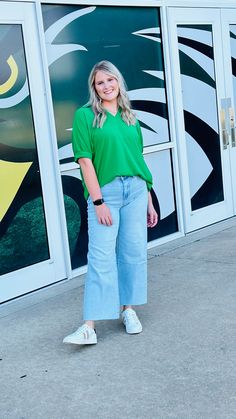 🌟Golden Kelly Blouse 🌟 Hey, fashionistas! Meet your new wardrobe MVP, the Golden Kelly Blouse! This vibrant green gem is perfect for those days when you want to add a pop of color and a whole lot of cheer to your outfit. 🌿 Crafted with the softest, most breathable fabric, this blouse promises to keep you comfy and cool, whether you're out on a sunny adventure or rocking your 9-to-5 grind. The relaxed fit and chic rolled sleeves make it a versatile piece that pairs perfectly with everything fr Versatile Green Top For Spring, Versatile Green Blouse With Relaxed Fit, Trendy Kelly Green Tops For Spring, Green V-neck Top For Day Out, Trendy Green Blouse For Work, Trendy Green V-neck Top, Versatile Green Short Sleeve Top, Green Relaxed Fit Versatile Blouse, Casual Kelly Green Tops