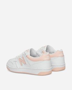 The 1980s-inspired BB480 sneaker from New Balance combines retro heritage basketball style with modern comfort. Featuring a classic white leather upper accented with pops of pink, this minimalist kicks complement any casual outfit. Cushioned Ortholite insole provides all-day wearability, while sturdy rubber sole is ready for downtown adventures. An effortlessly cool sneaker that will look great in Instagram posts and turn heads on the streets. Sporty White New Balance Skate Shoes, New Balance White Basketball Shoes With Rubber Sole, New Balance Low-top Basketball Shoes, New Balance White Basketball Shoes For Light Sports, New Balance Cushioned Basketball Shoes, New Balance Low-top Basketball Shoes With Cushioned Footbed, New Balance White Mid-top Basketball Shoes, White Mid-top New Balance Basketball Shoes, New Balance High-top Sneakers With Gum Sole For Sports