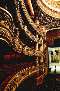 the interior of an old theater with ornately decorated walls