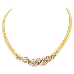 Adorn yourself with the enchanting elegance of the Van Cleef & Arpels 18K Yellow Gold Lovebirds Necklace, a rare vintage piece from the 1980s that captures the essence of timeless romance and luxury. This exquisite necklace features two intricately designed lovebirds, beautifully crafted in lustrous 18K yellow gold. The lovebirds are adorned with top-quality diamonds, adding a dazzling sparkle that enhances their captivating charm. Emerald accents for the eyes add a touch of vibrant color and so Luxury Yellow Gold Diamond Necklace With Accents, Gold Vans, Van Cleef & Arpels, Gold Link Necklace, Glamour Vintage, Pearl And Diamond Necklace, Van Cleef And Arpels, Bird Necklace, Station Necklace