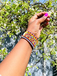 Handmade Africa beaded multi Unisex bracelet bangle.  This lovely bangle are made from glass beads.  Do not stretch or adjustable. Made in Kenya by the Masai Tribe. Unique gift. NOTE; THE BANGLE MEASUREMENTS ARE TAKEN WHILE THE BANGLE IS NOT FASTENED. All BRACELET MEASURING 8 INCHES LONG X 1.2 INCHES WIDE. Colourful Bangles, Masai Jewelry, Masai Tribe, Africa Kenya, Colorful Bangles, Bead Bangles, Maasai, Unisex Bracelets, Bracelet Bangle