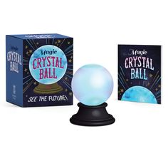 the crystal ball is in front of two boxes