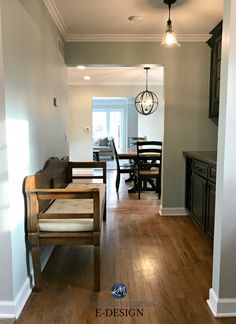 an empty living room and dining room with hard wood flooring