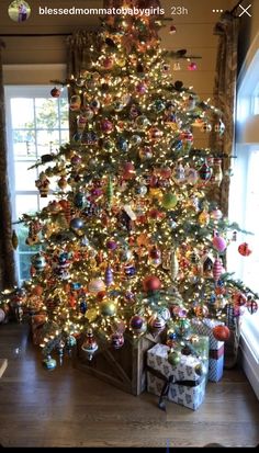 a decorated christmas tree in a living room