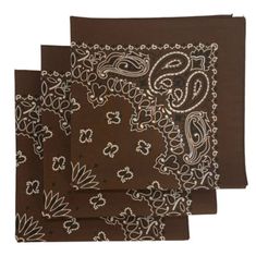 three brown bandannas with white designs on them