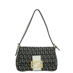 Material: Black Zucchino Spalmati Coated Canvas with White Leather Trim Hardware: Gold Features: Pockets: Interior Zipper Pocket Bag style: Shoulder Bag Closure type: Flap with FF Clasp Closure Serial Number / Stamp / Date Code: 2354 - 8BR180 - LPN - 078 Measurement in inches: W x D x H Inclusions: Nothing Condition: Used in good condition – 7 out of 10 Exterior: very good condition, with scratches on the hardware and showing normal signs of use. Interior: good condition, with spots on fabric and showing normal signs of use. Designer Black Baguette Bag With Branded Hardware, Luxury Baguette Bag With Zipper Closure For Shopping, Luxury Shopping Baguette Bag With Zipper Closure, Designer Black Baguette Bag With Gold-tone Hardware, Black Designer Baguette Bag With Gold-tone Hardware, Designer Black Baguette Bag, Black Baguette Bag With Gold-tone Hardware, Number Stamps, Handbag Wallet