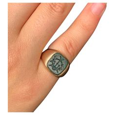 Classic Georgian style antique bloodstone intaglio and 9K rose gold signet ring. Late 19th Century The bloodstone intaglio of interconnected symbols and the letter W or M, depending on how you choose to wear it, set in a substantial solid rose gold setting. Beautiful pinky ring, lovely pairing of bloodstone and rose gold. Marks: C G maker's mark, 9 for 9K gold Condition: Very good, nice patina, this ring was professionally sized, tiny abraisions to the border of the bloodstone. Size: 3.25-3.5 US Bloodstone Ring, Silver Signet Ring, Letter W, Gold Signet Ring, Pinky Ring, Signet Ring, Or Rose, 19th Century, Patina