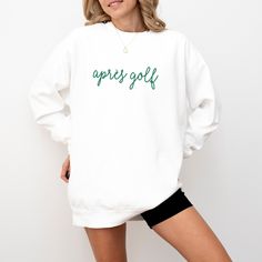 Golf Sweatshirt for Golfer Apres Golf Sweatshirt Gift for Golf Wife Golf Team Sweatshirt Golf Gift Ideas Golf Crewneck Gift for Golfer Gift 𝐏𝐑𝐎𝐃𝐔𝐂𝐓 𝐃𝐄𝐓𝐀𝐈𝐋𝐒 * 80% ring-spun cotton, 20% polyester * Medium-heavy, garment-dyed fabric * Unisex, crewneck sweatshirt (*Please refer to the size chart in listing images to ensure correct fit; size up for a slouchier fit) * Relaxed fit * Comfort Colors brand 𝐇𝐎𝐖 𝐓𝐎 𝐎𝐑𝐃𝐄𝐑 * Select your desired sweatshirt color * Select your size (*Ple White Crew Neck Sweater For Sports Season, Sporty Long Sleeve Sweatshirt For Golf, Sporty Letter Print Sweatshirt For Golf, White Sports Sweater With Letter Print, Sporty Crew Neck Golf Sweatshirt, Sporty Crew Neck Sweatshirt For Golf, White Letter Print Sweater For Sports, Cotton Long Sleeve Golf Sweatshirt, White Collegiate Golf Tops