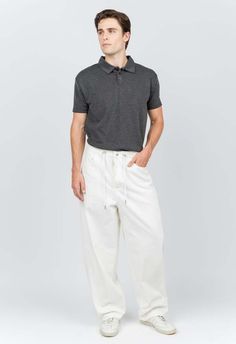 One size. fits xs-xl  color: white  adjustable waist  lightweight fabric  baggy fit  100% cotton  dry clean  by the nkc store    product measurements:  waist: 86.36cm / 34in  inseam: 66cm / 26in    model is 185cm / 6’1” wearing size o/s White Cotton Cargo Pants For Streetwear, Casual White Cotton Cargo Pants, White Straight Leg Cotton Cargo Pants, White Cotton Straight Leg Cargo Pants, White Relaxed Fit Cotton Cargo Pants, Modern White Pants With Straight Hem, White Relaxed Fit Wide Leg Cargo Pants, Modern Cotton Bottoms With Straight Hem, Modern White Tapered Leg Pants