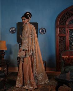 Elegant Semi-stitched Wedding Dress With Traditional Drape, Elegant Wedding Dress With Dupatta And Traditional Drape, Reception Traditional Wear With Pearl Embroidery, Bollywood Gold Wedding Dress With Dabka Work, Elegant Semi-stitched Wedding Dress With Zari Work, Gold Floor-length Wedding Dress With Dabka Work, Gold Wedding Dress With Dabka Work, Elegant Wedding Dress For Eid With Traditional Drape, Elegant Wedding Dress With Traditional Drape And Dupatta