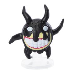 a black and yellow toy with horns on it's head