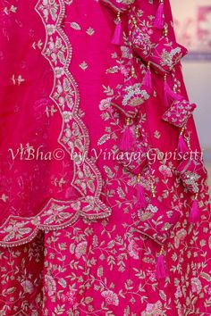 Elevate your special occasion look with our Dark Pink Raw Silk Embroidered Lehenga Set. Crafted with intricate Resham and Zardosi embroidery and finished with scalloped borders, it exudes luxury and elegance. The set includes a Dark Pink Raw Silk Lehenga Blouse and a Net Dupatta, making it a perfect choice for the brides.. Floral Embroidered Sharara For Receptions And Festivals, Floral Embroidered Sharara For Festivals And Receptions, Festival Sharara With Floral Embroidery And Traditional Drape, Floral Embroidered Sharara For Festivals With Traditional Drape, Floral Embroidered Sharara For Wedding Navratri, Floral Embroidered Sharara For Wedding And Navratri, Festive Embroidered Sharara For Reception, Floral Embroidered Sharara With Traditional Drape For Wedding, Floral Embroidery Sharara With Traditional Drape For Wedding