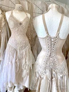 three mannequins are lined up next to each other in white lacy dresses