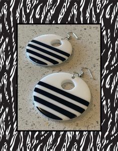 This is a super fun pair of white and black striped Lucite donut earrings from the 1980's. The hoops measure 3" high (including the ear wire) and 2" across and the hole is set slightly higher. The earrings are finished off with a silver french wire and a small silver ring. The earrings are in good used vintage condition with some light wear. A perfect gift for yourself or someone you love! Donut Earrings, Vintage Statement Earrings, Donuts Earrings, Striped Earrings, Fairy Jewelry, French Wire, Valentine Gift, Air Dry Clay, Gift Christmas