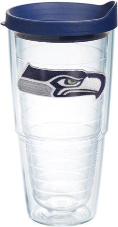 the seattle football team is depicted on this plastic tumbler cup with a blue lid