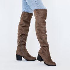 A round-toe over-the-knee boot made with soft and flexible vegan suede uppers finished with a smart zipper entry and a dramatic stacked block heel. Please refer to size chart for calf measurements. • Round-Toe • Inside Zipper Entry • Over-the-knee 23-in Shaft Height • Padded Footbed • 3 3/4-in Block Heel • Vegan Suede Uppers All measurements are approximate and were taken using a size 6. Please note measurements may vary slightly by size. Shoe Last, Thick Socks, Sleek Style, Cute Boots, Wide Boots, Wide Fit Boots, Journee Collection, Sleek Fashion, Buy Shoes