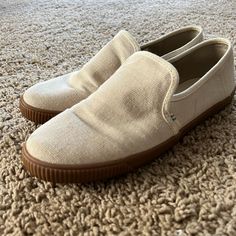 **Never Worn** Comfy And Casual Toms Slip On Sneakers! Great To Enhance Your Fall Look Casual Brown Slip-ons For Everyday, Beige Low-top Casual Slip-ons, Casual Almond Toe Slip-ons For Spring, Casual Beige Low-top Slip-ons, Casual Cream Closed Toe Slip-ons, Casual Everyday Slip-ons With Almond Toe, Casual Beige Flat Slip-ons, Casual Almond Toe Slip-ons For Everyday, Casual Beige Sneakers For Everyday